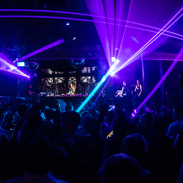 Sound-Bar dance floor under purple and blue lights